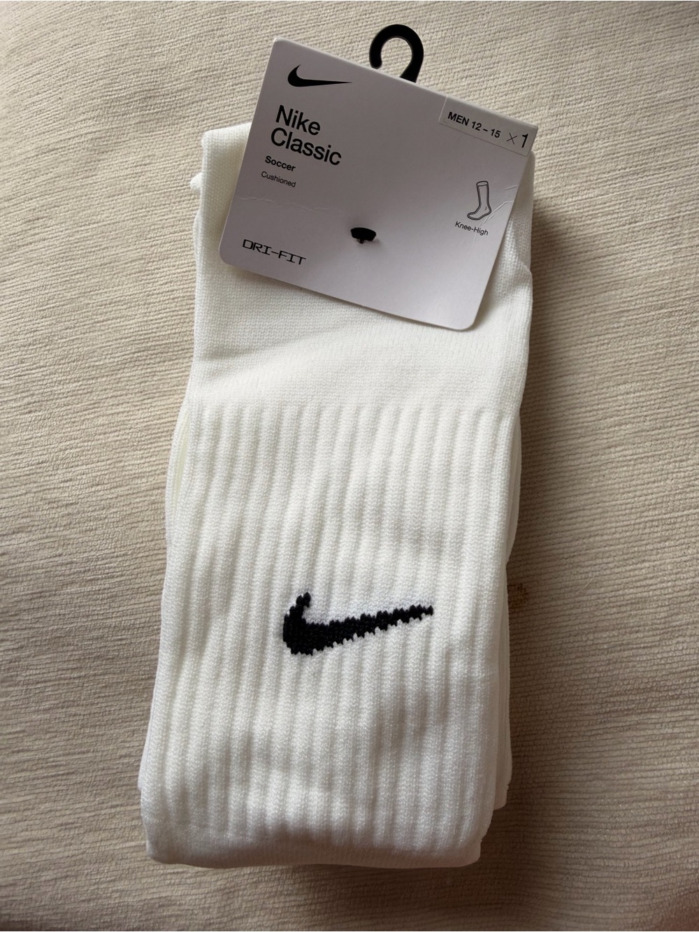 Nike White Knee-High Athletic Socks with Black Swoosh